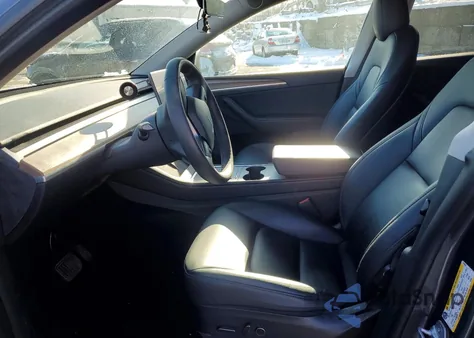 2023 Tesla Model Y from USA, damaged, VIN 7SAYGDEE3PF610693